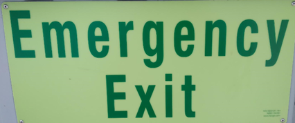 A sign with green text

Description automatically generated