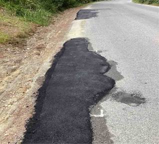 A road with tarmac and asphalt

Description automatically generated with medium confidence
