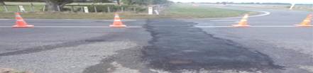 A road with a broken road

Description automatically generated with medium confidence
