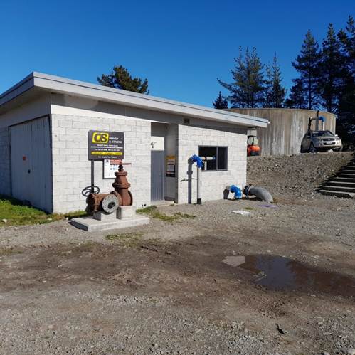 A building with a fire hydrant
AI-generated content may be incorrect.