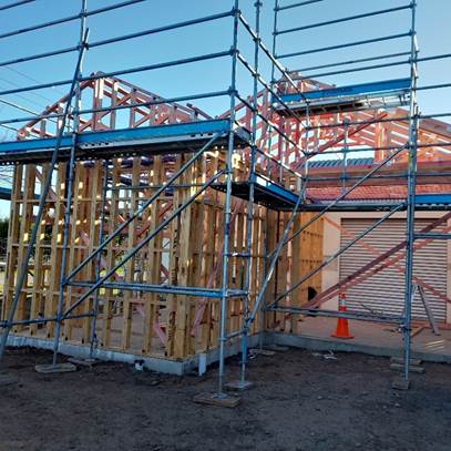 A building under construction with scaffolding
AI-generated content may be incorrect.