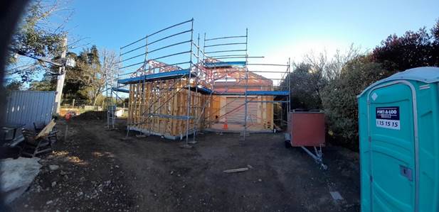 A building under construction with scaffolding
AI-generated content may be incorrect.